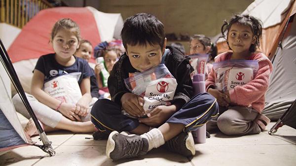 Image of children who received care kits from Save The Children